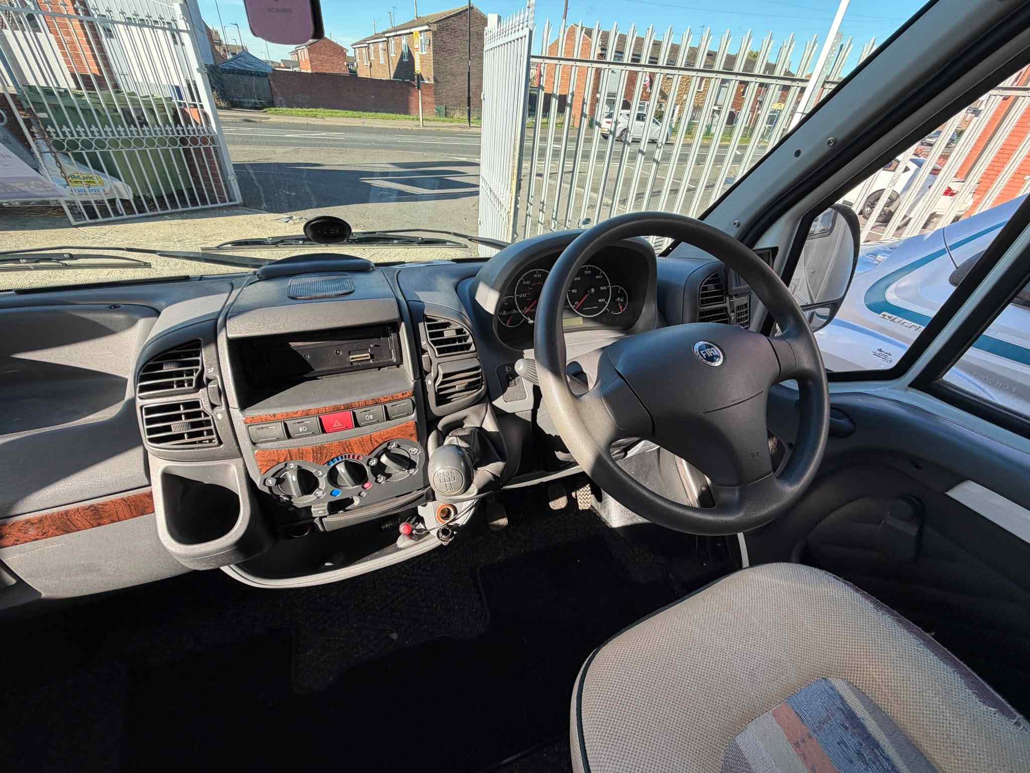2005 Auto-Trail Tracker SE motorhome showing Fiat Ducato dashboard and manual gearbox