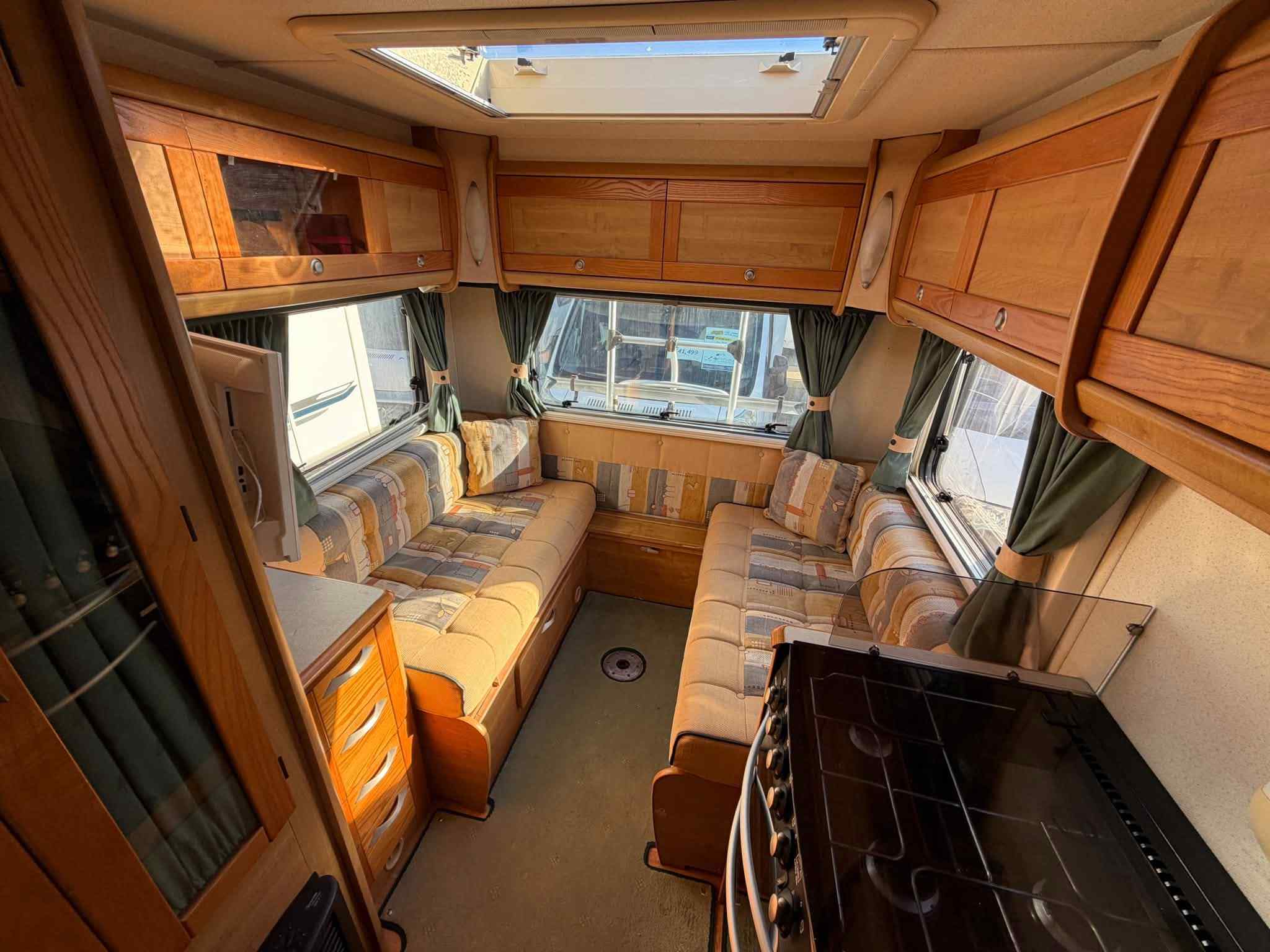 2005 Auto-Trail Tracker SE motorhome showing spacious rear lounge seating area